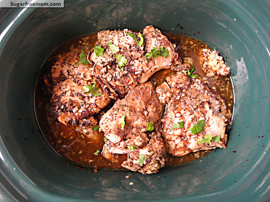 pot with chicken thighs and seasons