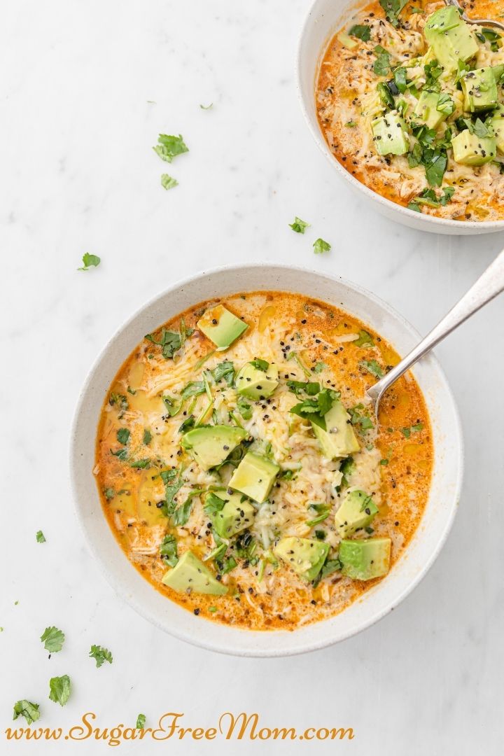 This delicious Keto White Chicken Chili can be made in the Instant Pot in 20 minutes or slow cooker if your prefer. Perfect for a busy weeknight and a favorite for the whole family! 