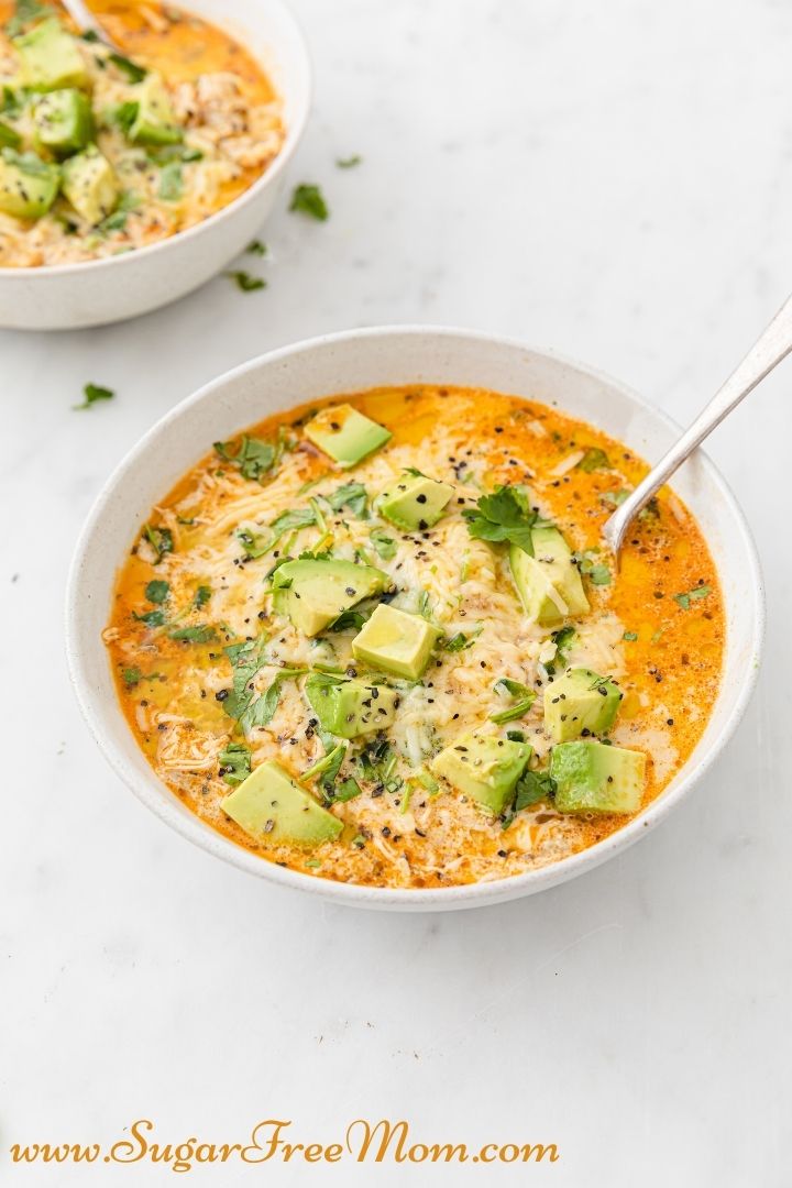 This delicious Keto White Chicken Chili can be made in the Instant Pot in 20 minutes or slow cooker if your prefer. Perfect for a busy weeknight and a favorite for the whole family! 