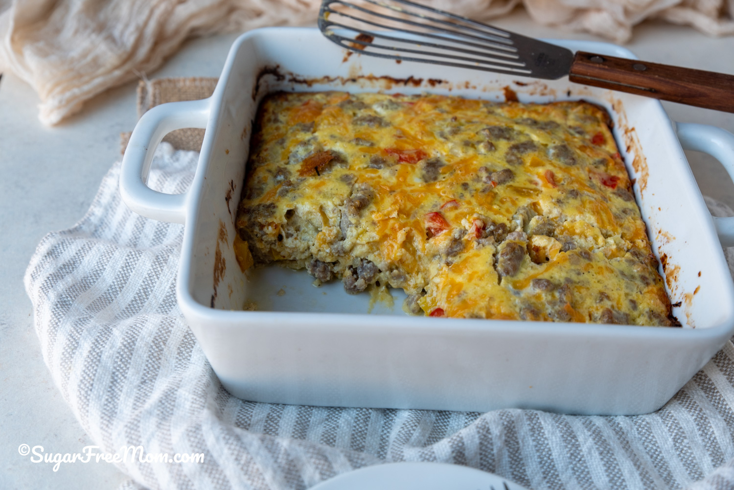 large white serving dish of breakfast casserole