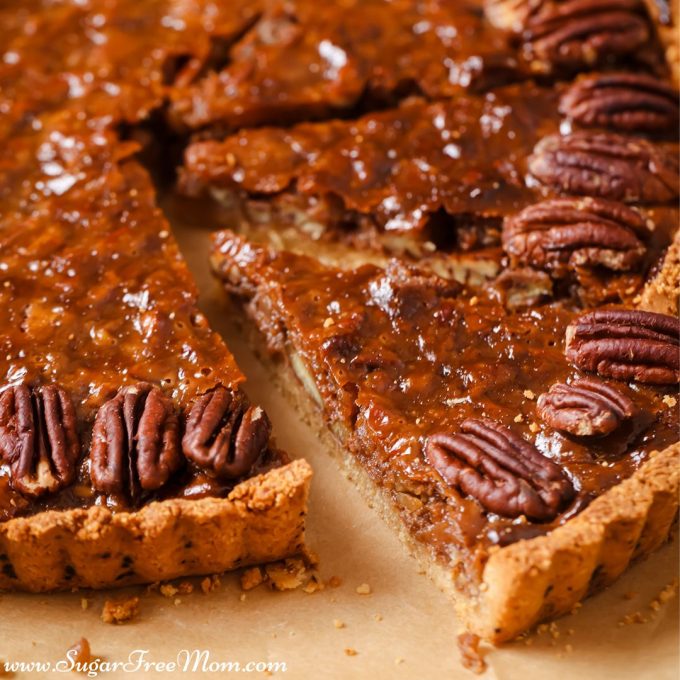 pecan pie with a few slices cut out