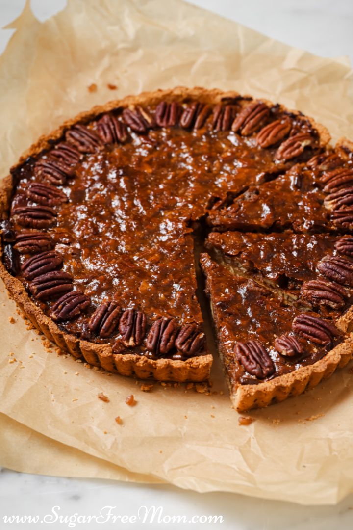 pecan pie with a few slices cut out