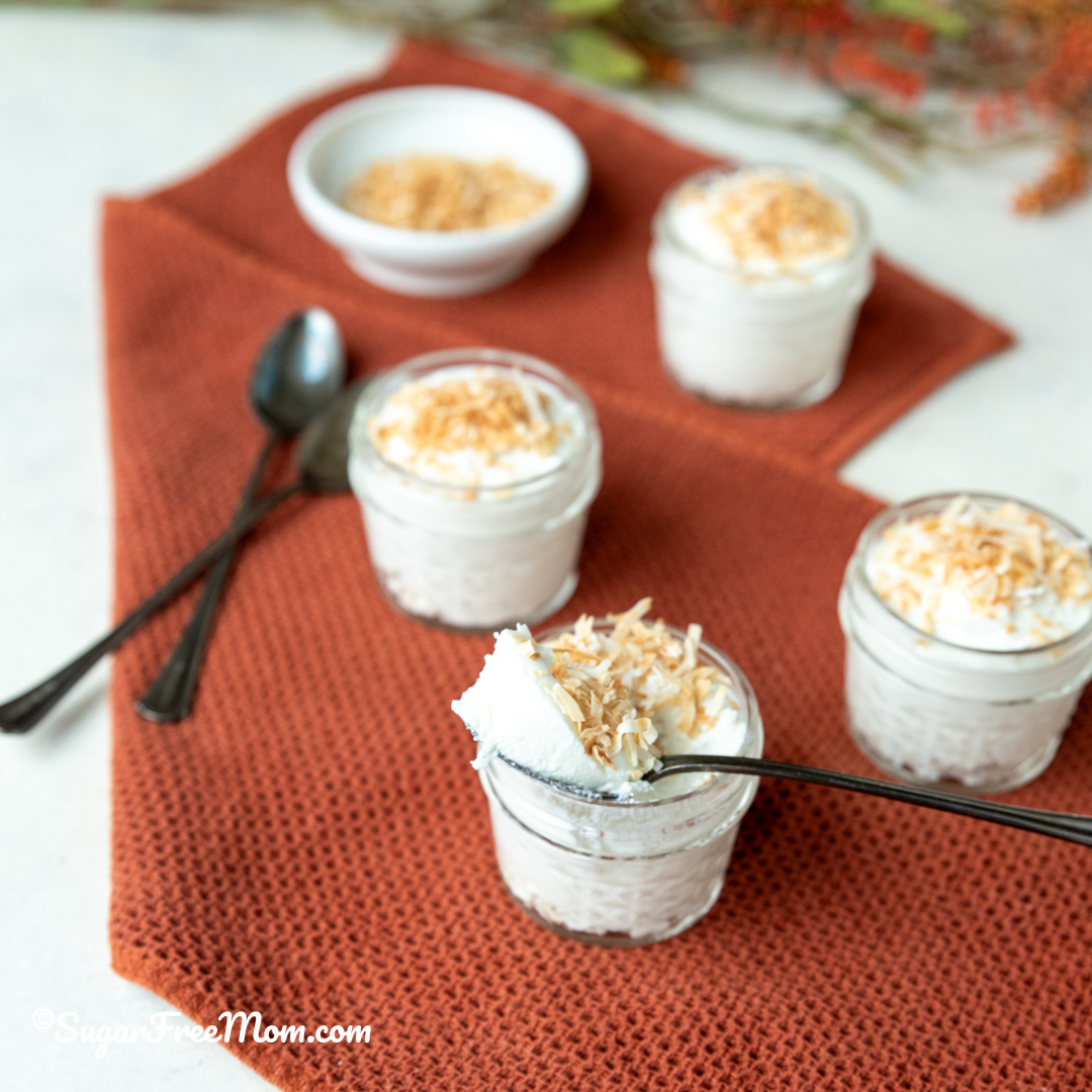 With just 7 simple ingredients, this easy keto Pina Colada Cottage Cheese Fluff is full of tropical flavors. This sweet treat is high protein with 8 g protein per serving!